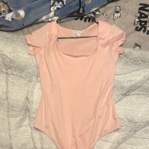 and now this bodysuit size small! pink